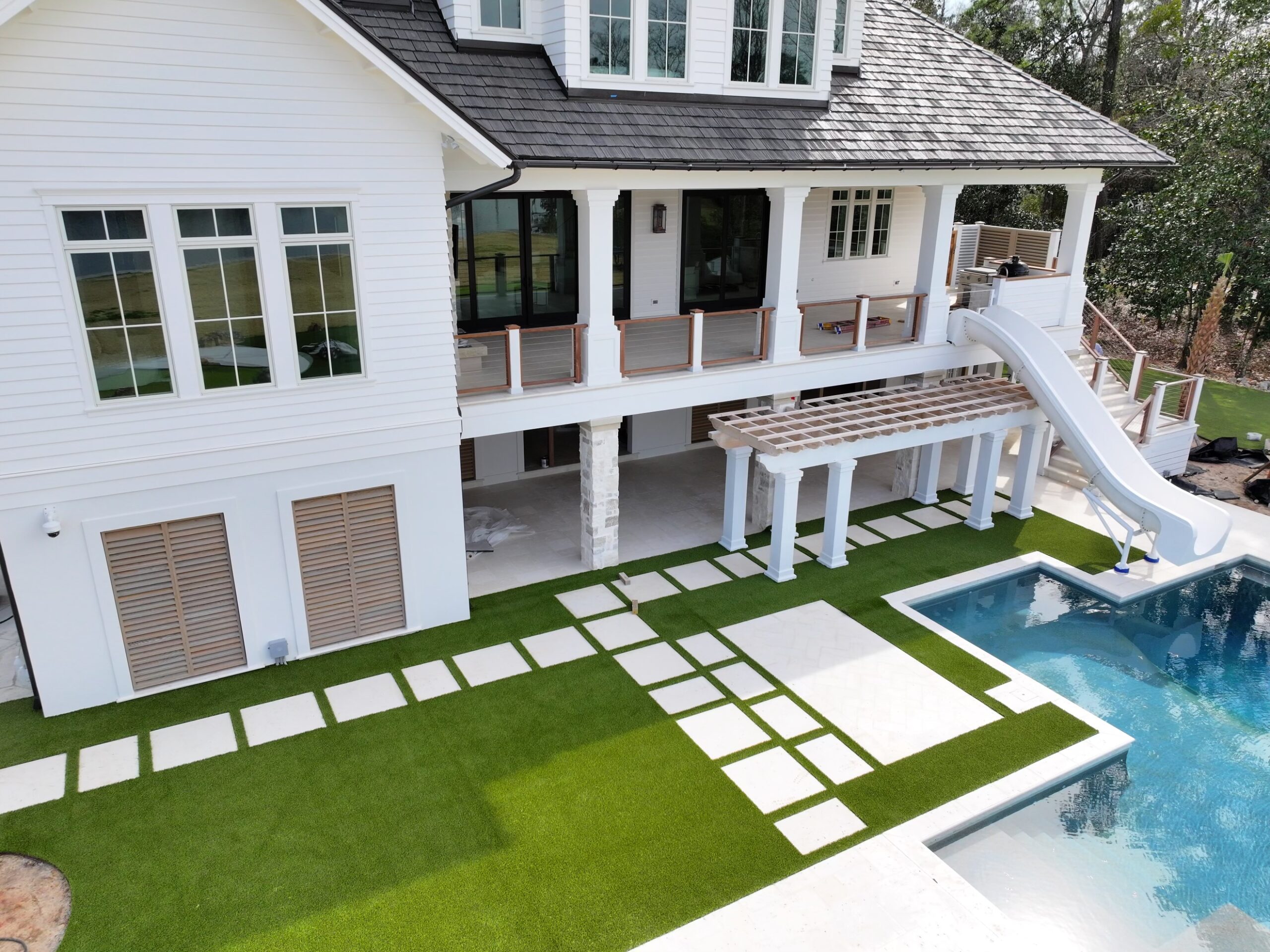 Artificial turf pool surround